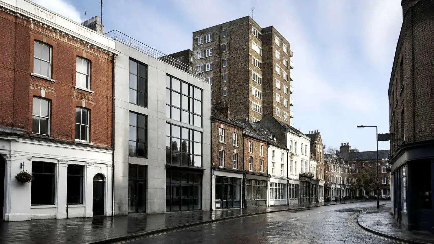 A British high street of commercial and residential buildings